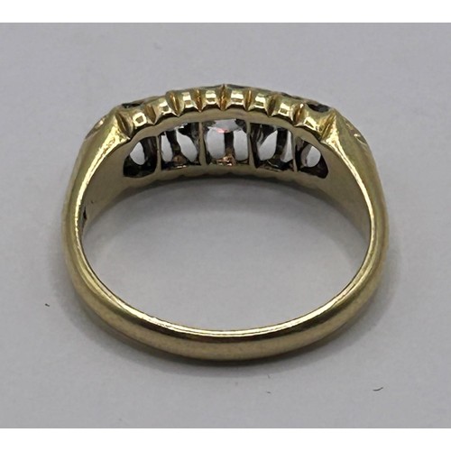 122 - An 18ct gold and five stone diamond ring, ring size J