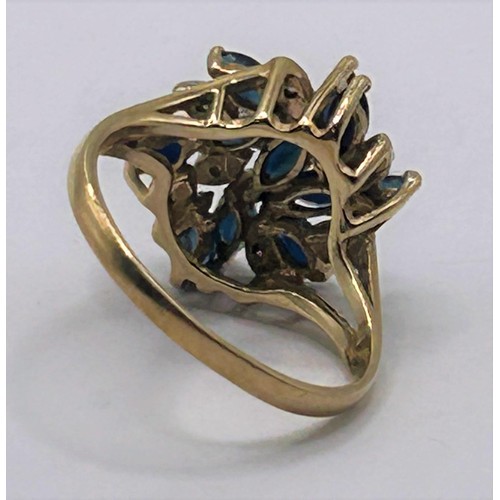 128 - A 9ct gold, diamond and sapphire cluster ring, ring size J