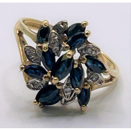 128 - A 9ct gold, diamond and sapphire cluster ring, ring size J