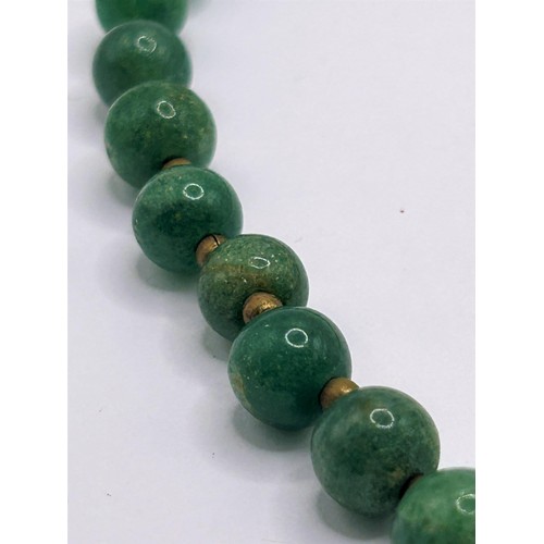 130 - A green stone bead necklace