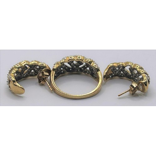 137 - A 9ct gold and diamond cluster ring, and a matching pair of earrings (3)