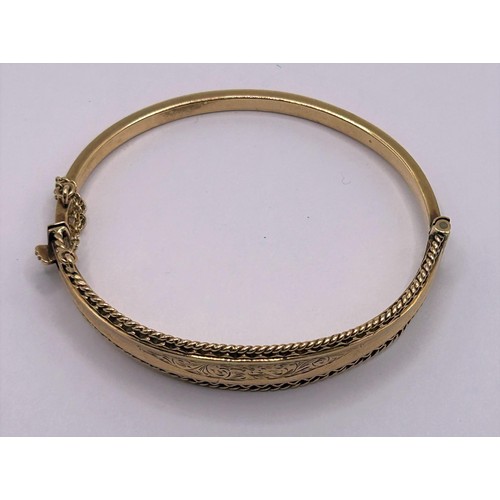 152 - A 9ct gold bangle, 11.9 g