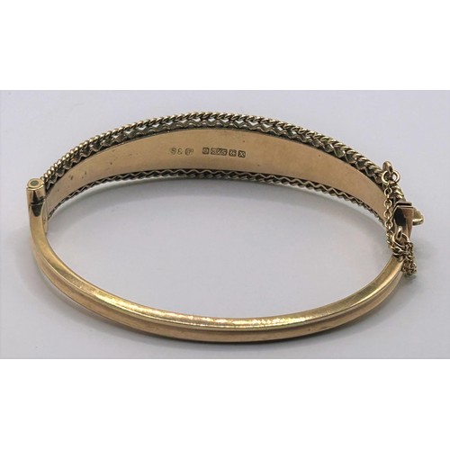 152 - A 9ct gold bangle, 11.9 g