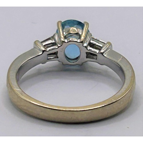 166 - An 18ct white gold, aquamarine and diamond ring, ring size L