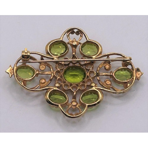 167 - A 9ct gold, peridot and pearl brooch, 5 cm wide