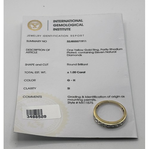 175 - An 18ct gold and diamond ring, ring size S, with an International Gemological Institute Certificate