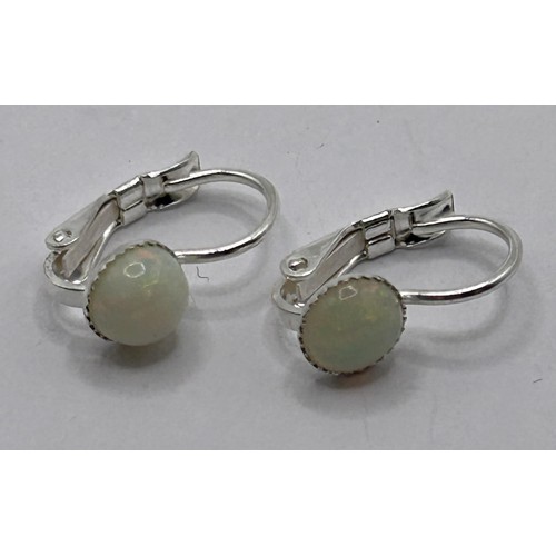 30 - A pair of silver and opal hoop earrings...