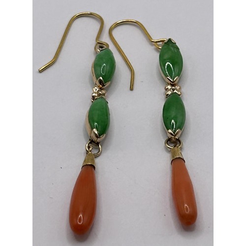 31 - A pair of 14ct gold, coral and jade drop earrings...