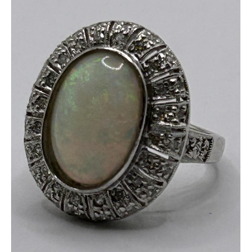 36 - A 14ct gold, opal and diamond cluster ring, ring size L...