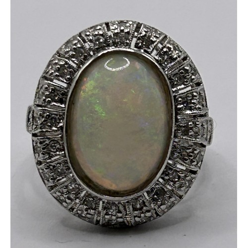 36 - A 14ct gold, opal and diamond cluster ring, ring size L...