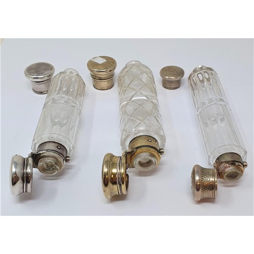 347 - A Victorian double ended scent bottle, with silver mounts, and two others (3)