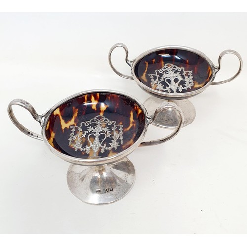 359 - A pair of George V silver and tortoiseshell comports, London 1911, 12.5 cm wide (2)