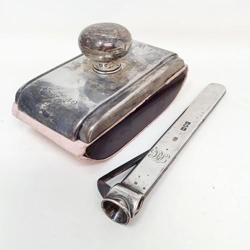 361 - A late Victorian silver cigar cutter, London 1900, and a silver mounted blotter (2)