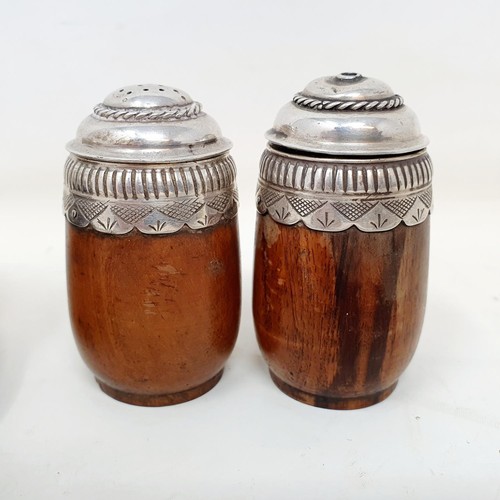 367 - An Arts & Crafts silver and turned wood three piece cruet and stand, London 1938 (4)