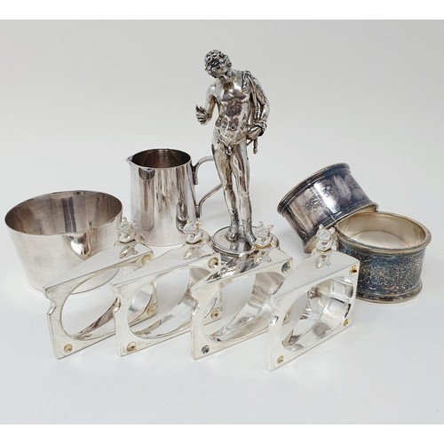 360 - A silver coloured metal figure of a man in classical pose, a salt, a jug, two napkin rings, and four... 