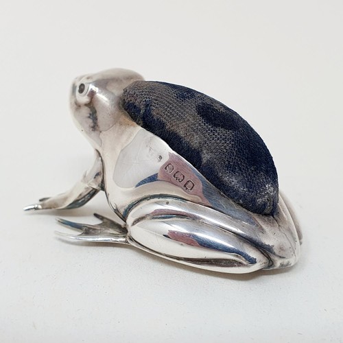 282 - A novelty silver pincushion, in the form of a frog, marks rubbed, 5 cm