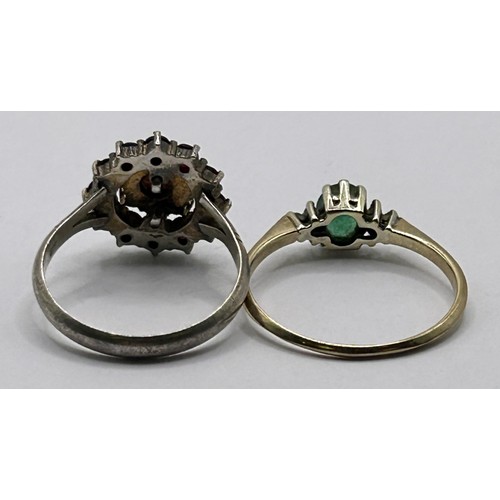 18 - A 9ct gold, garnet and seed pearl ring, ring size M, and a green stone ring, ring size Q (2)...