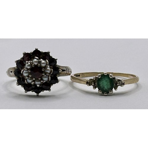 18 - A 9ct gold, garnet and seed pearl ring, ring size M, and a green stone ring, ring size Q (2)...