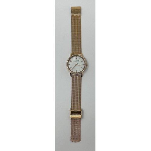 249 - A Skagen of Denmark rose gold plated and cubic zirkonia wristwatch, with a mother of pearl dial and ... 