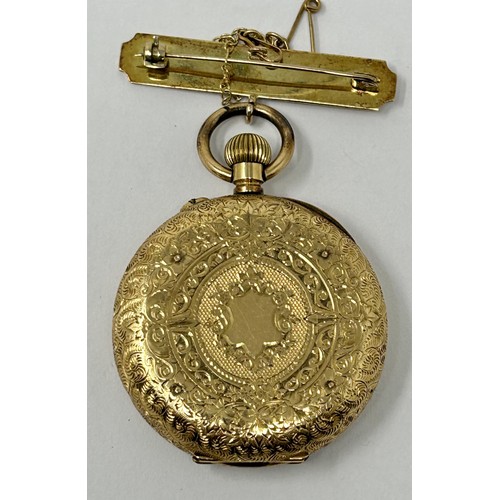 251 - An 18ct gold open face fob watch, with a gold plated bar brooch, all in 54.2 g