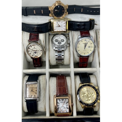 244 - A collection of copies of iconic watches from around the world, in a case (12)