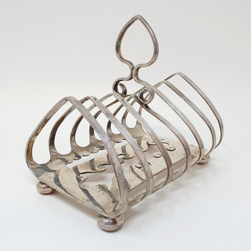 394 - A George V silver toast rack, Sheffield 1929, 9.8 ozt