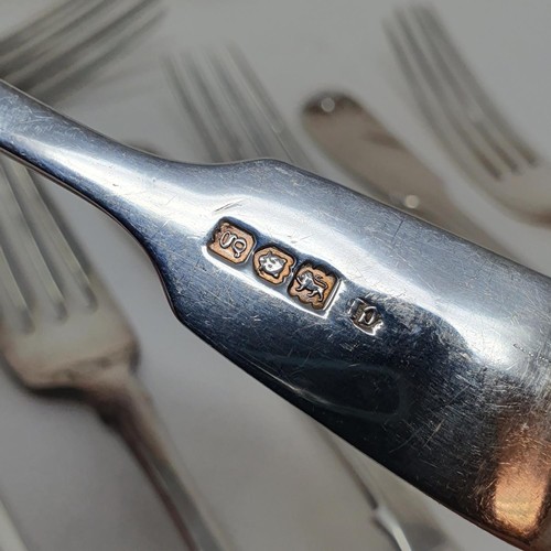 348 - A Victorian silver fiddle pattern dessert fork, and assorted other dessert forks, various dates and ... 