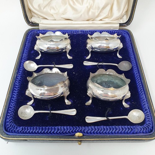 291 - A George V set of four silver salts, with matching spoons, London 1912, 5.5 ozt, cased