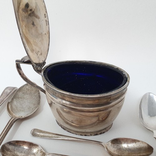 296 - A George V silver oval mustard pot, with a blue glass liner, and assorted flatwares, various dates a... 