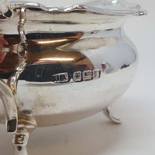 316 - A George V silver sugar bowl, and a matching cream jug, Sheffield 1911, 8.7 ozt
Provenance:  Sold on... 