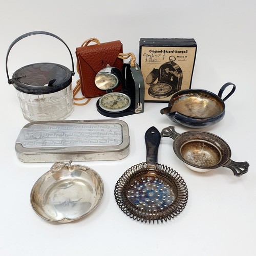 317 - A George V silver cream jug, a Continental silver coloured metal wine taster, a compass and other it... 