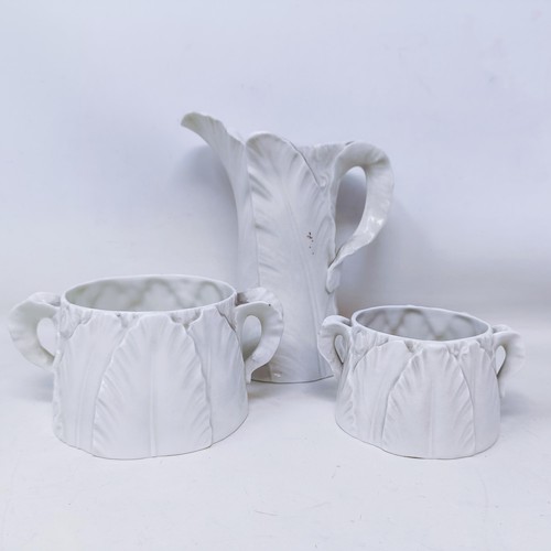 530 - A Royal Worcester set of four graduated leaf molded jugs, the largest 24 cm high, and two similar su... 