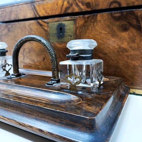 534 - A 19th century walnut writing slope, 41 cm, and an oak desk stand, 29 cm wide