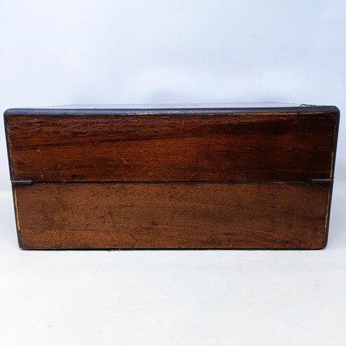 534 - A 19th century walnut writing slope, 41 cm, and an oak desk stand, 29 cm wide