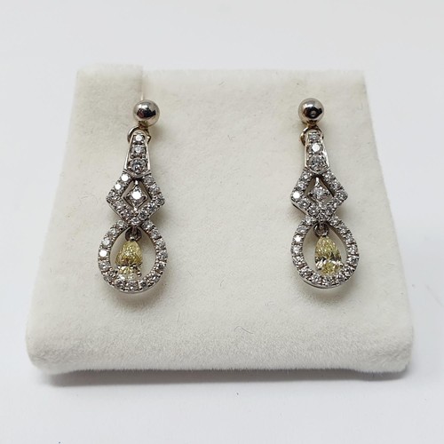 58 - A pair of diamond pendant drop earrings...