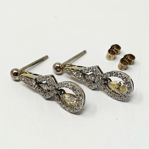 58 - A pair of diamond pendant drop earrings