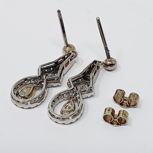 58 - A pair of diamond pendant drop earrings...