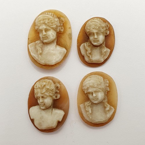 162A - A cameo, decorated classical portrait, 16 x 12 mm, and three others (4)

Provenance: From a local de... 