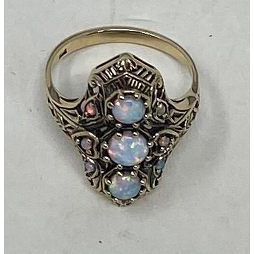 226A - A 9ct gold and opal ring, ring size N