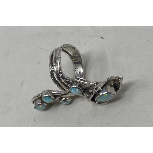 212A - A silver and opal naturalistic set ring, ring size M