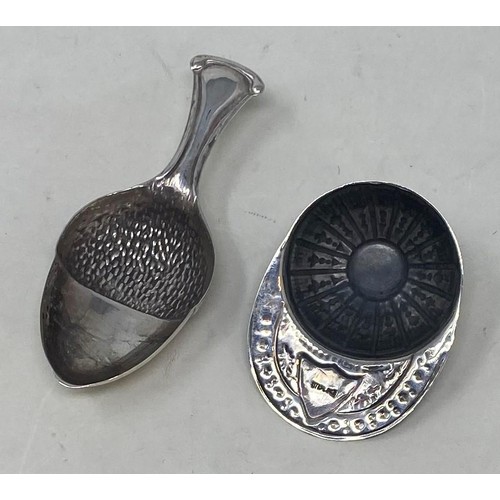 406 - A novelty silver caddy spoon, in the form of a cap, another in the form of an acorn