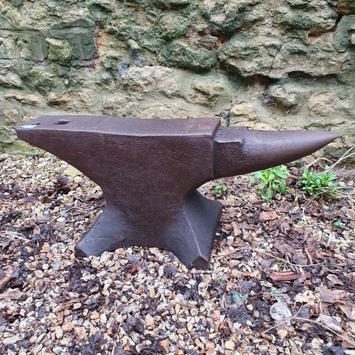 948 - An iron anvil, 81 cm wide