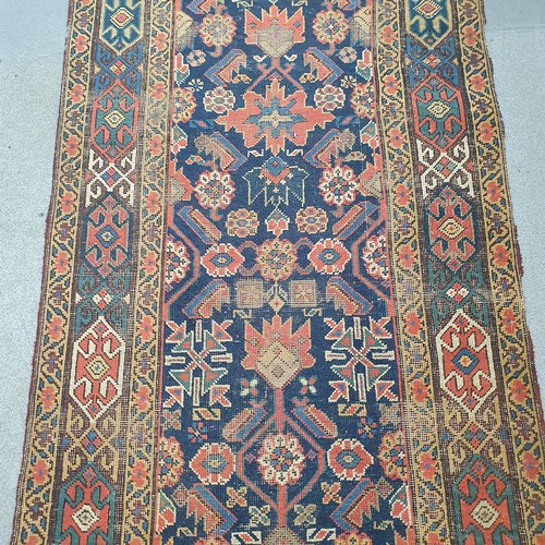 944 - A Persian blue ground runner, 500 cm x 79cm