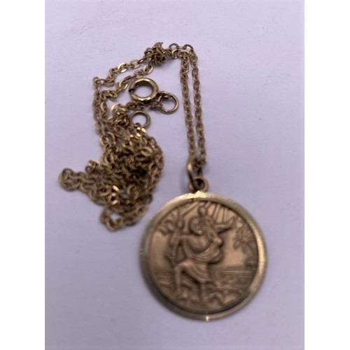 39 - A 9ct gold St. Christopher, on a chain...