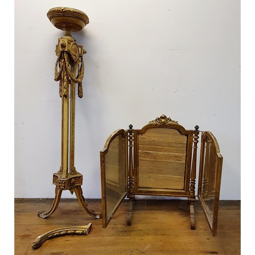 946 - An early 20th century gilt wood and gesso triptych mirror, and a pedestal (2)