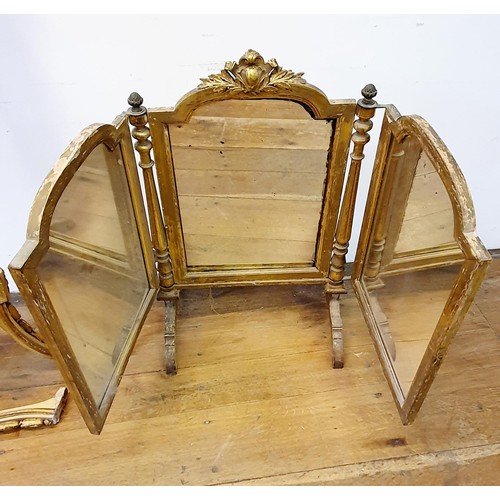 946 - An early 20th century gilt wood and gesso triptych mirror, and a pedestal (2)