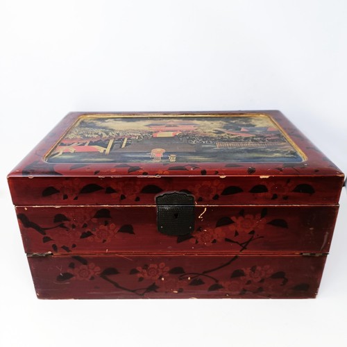 501 - A late 19th/early 20th century Japanese lacquered writing box, 40 cm wide