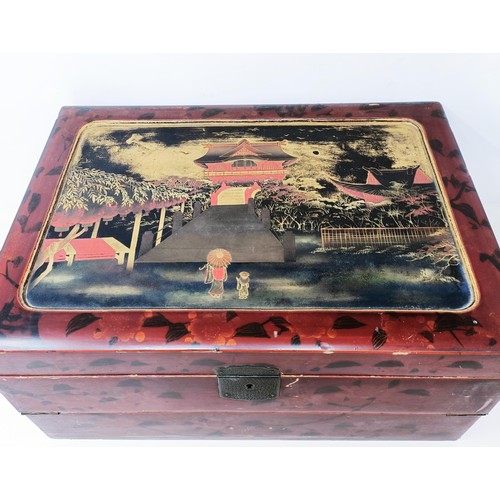 501 - A late 19th/early 20th century Japanese lacquered writing box, 40 cm wide