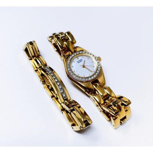 520 - An Art Deco style figure of a lady, 43 cm high, a ladies Citizen wristwatch, and a matching bracelet... 