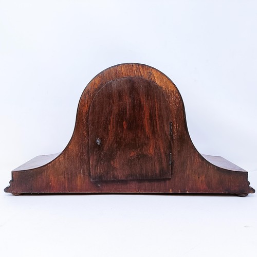 561 - A mantel clock, in a mahogany case, 34 cm high, and another (2)